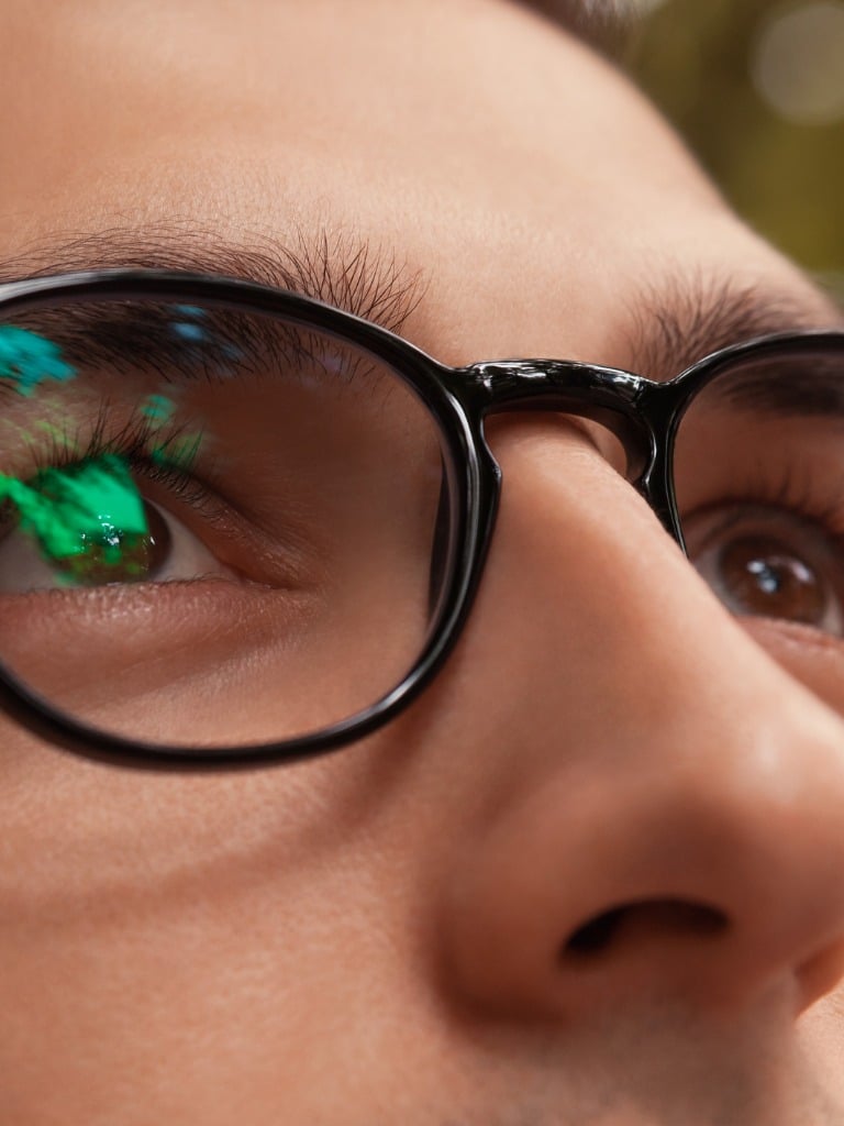 Closeup of man wearing glasses